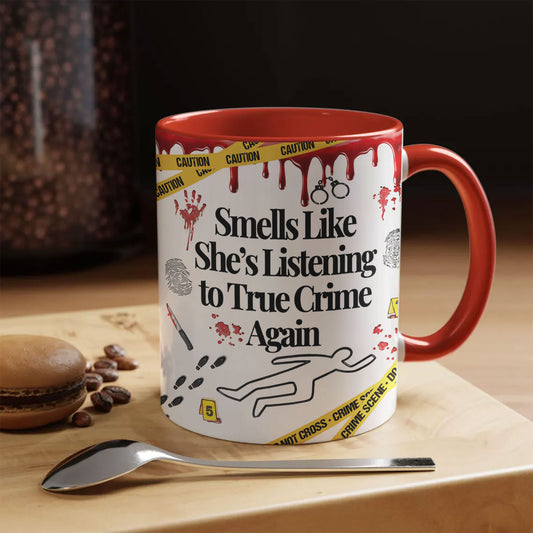 Funny True Crime Mug – “Smells Like She’s Listening to True Crime Again” Coffee Cup